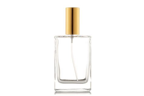 gold top clear bottle cologne.